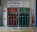 A neatly organised AS4332-compliant gas cylinder storage zone in an Australian automotive workshop